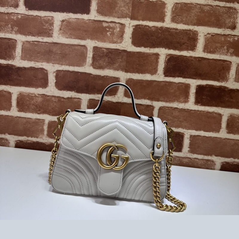 G*u*i top handle bags